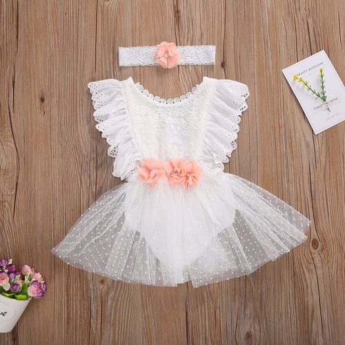 This little dress romper with white lace and peach rhinestone flowers is just the sweetest little baby girl outfit we have ever seen. The matching flower headband is the icing on the cake. Your little one will be picture perfect in her tutu skirt romper with little ruffle sleeves and lace eyelet detailing.